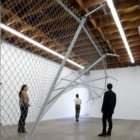Twisting-barbed-wire-fence-installed-by-Didier-Faustino-at-Cincinnatis-Contemporary-Arts-Center_dezeen_1sq